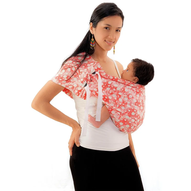 portabebe pouch rosado con circulos blancos