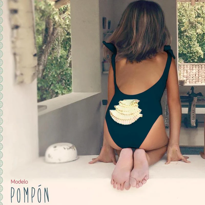 vestido de bano pompon azul 7t