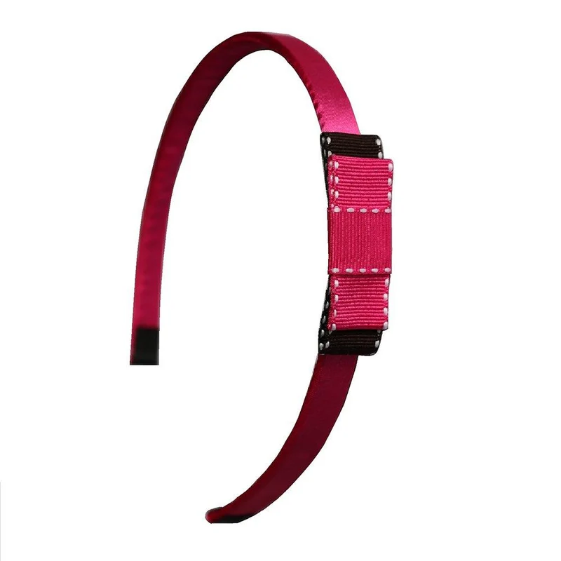 diadema escolar forrada en satin mono cafe y fucsia