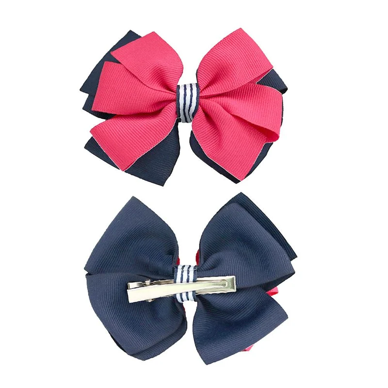 pinza mono azul con fucsia