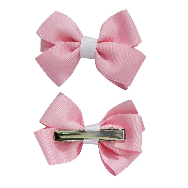 par de pinzas mono rosado