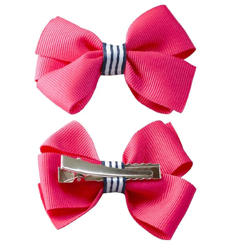 par de pinzas mono fucsia