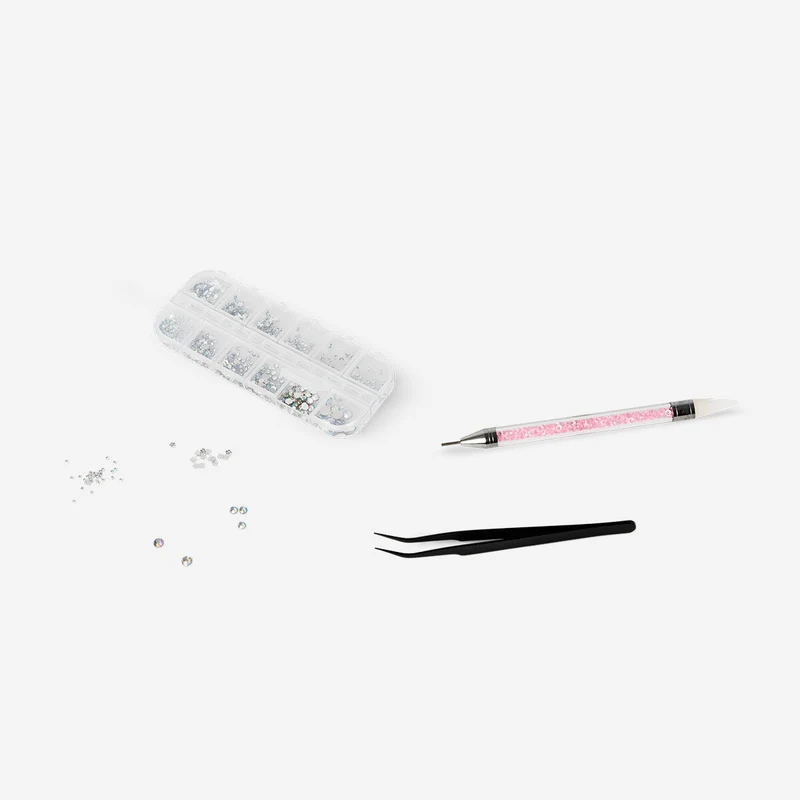 Nail decorating kit with rhinestones and applicator