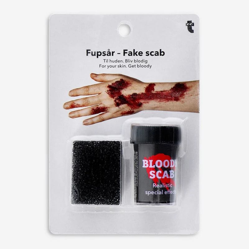 Fake scab for skin with fake blood set