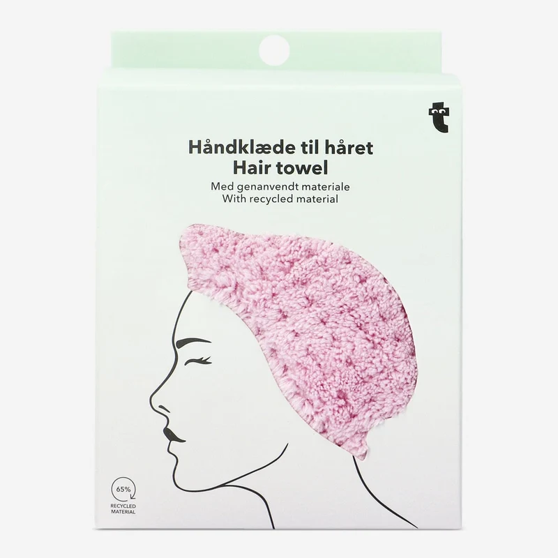 Plush pink hair towel with twist-and-button design